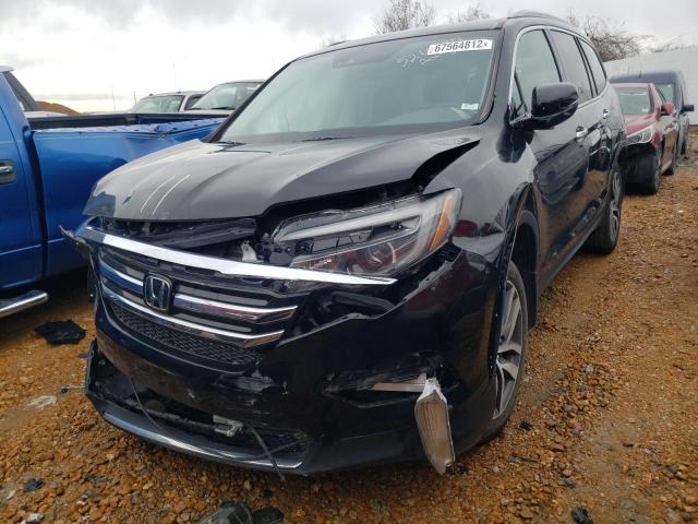 HONDA PILOT ELIT 2018 with VIN 5FNYF6H06JB060764 - Photo from auction
