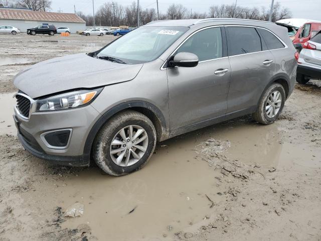 KIA SORENTO LX 2016 with VIN 5XYPG4A35GG073590 - Photo from auction