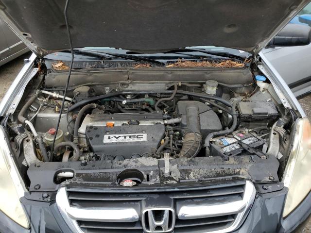 Photo 12 from auction – 2004 HONDA CR-V LX with VIN SHSRD68434U207696