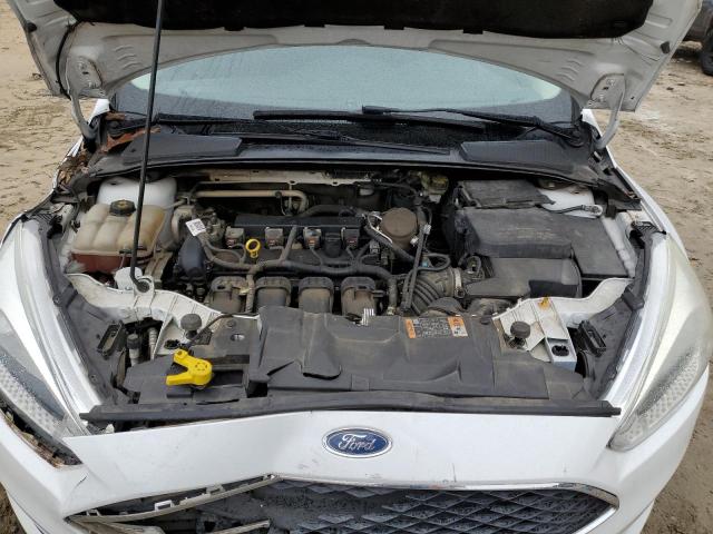Photo 11 from auction – 2015 FORD FOCUS SE with VIN 1FADP3F29FL207748