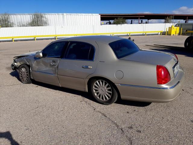 Photo 2 from auction – 2004 LINCOLN TOWN CAR E with VIN 1LNHM81W44Y620037