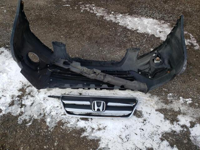 Photo 13 from auction – 2006 HONDA CR-V LX with VIN JHLRD78506C809075