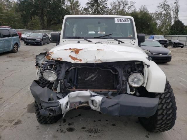 Photo 5 from auction – 2010 JEEP WRANGLER U with VIN 1J4BA5H12AL228463