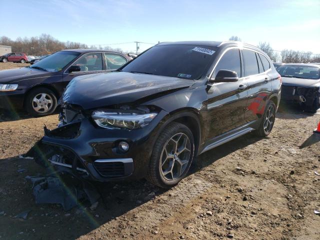 BMW X1 XDRIVE2 2018 with VIN WBXHT3C31J5L33249 - Photo from auction