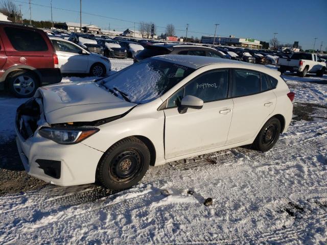 SUBARU IMPREZA 2017 with VIN 4S3GTAA64H3707353 - Photo from auction