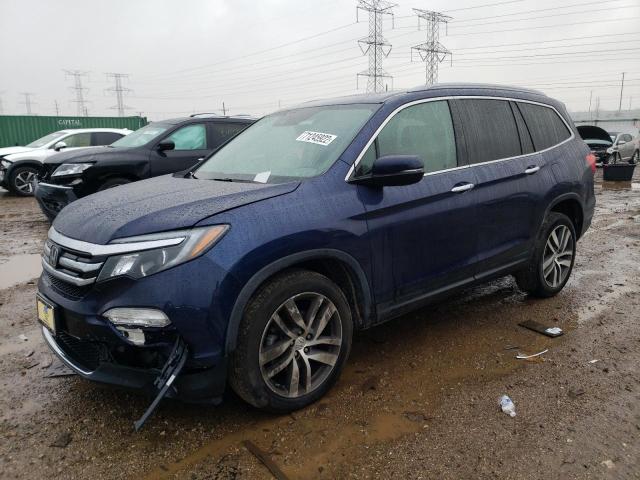 HONDA PILOT TOUR 2017 with VIN 5FNYF6H92HB058356 - Photo from auction