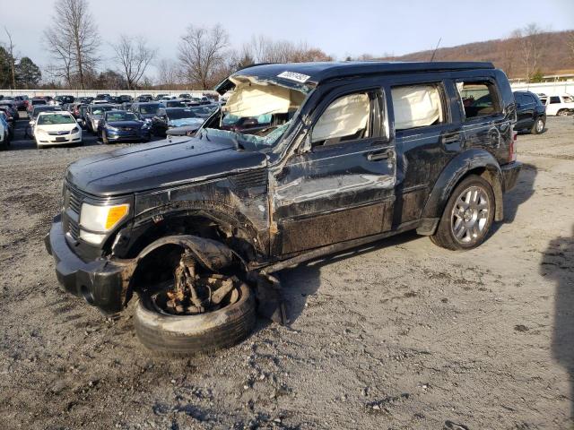 DODGE NITRO HEAT 2011 with VIN 1D4PU4GXXBW512557 - Photo from auction