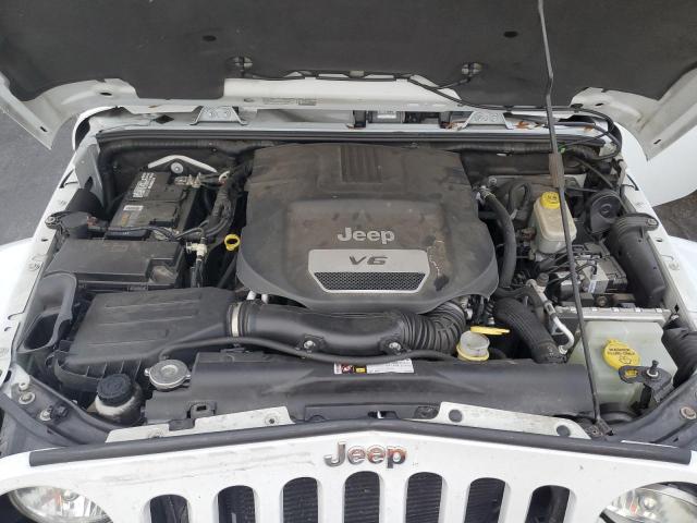 Photo 11 from auction – 2014 JEEP WRANGLER U with VIN 1C4BJWEG1EL272805