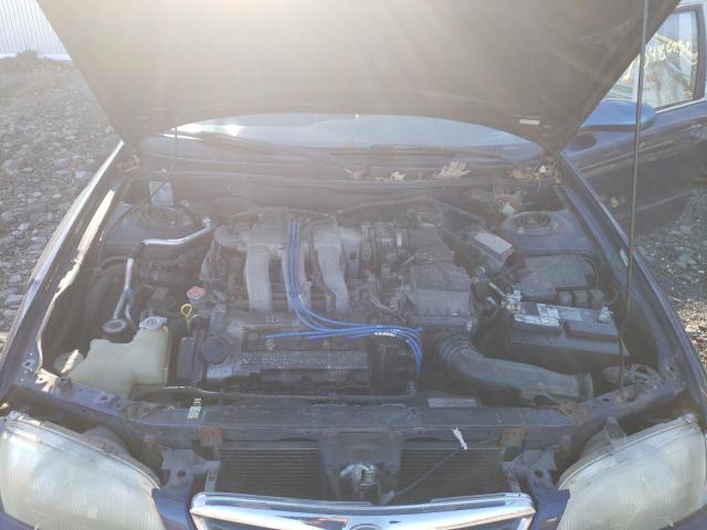Photo 11 from auction – 1999 MAZDA 626 ES with VIN 1YVGF22D1X5890654
