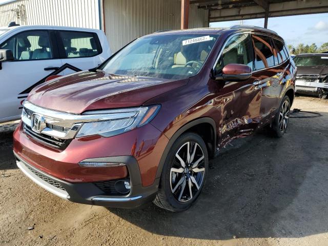 HONDA PILOT ELIT 2022 with VIN 5FNYF6H00NB000145 - Photo from auction
