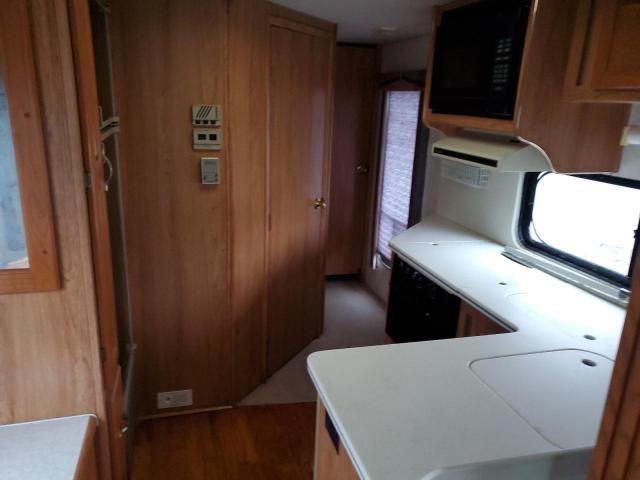 Photo 6 from auction – 1997 FORD COACHMAN with VIN 3FCMF53GXVJA05847