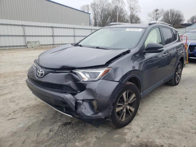 TOYOTA RAV4 XLE 2016 with VIN JTMWFREVXGD082324 - Photo from auction