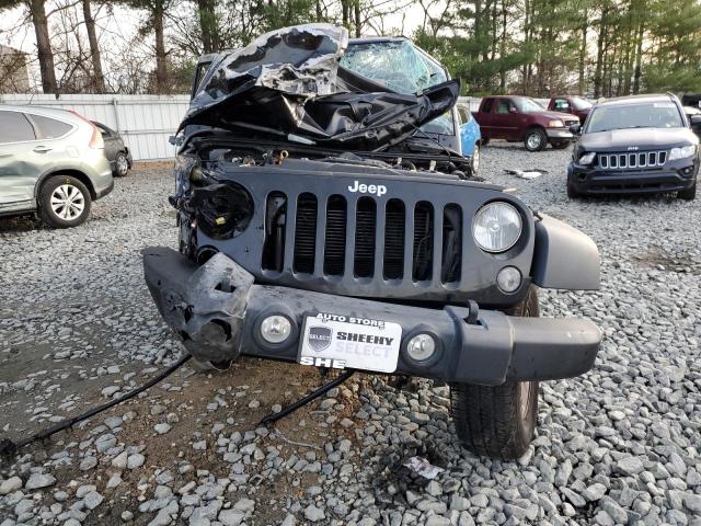Photo 5 from auction – 2016 JEEP WRANGLER U with VIN 1C4BJWDG9GL348226