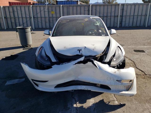 Photo 5 from auction – 2021 TESLA MODEL 3 with VIN 5YJ3E1EA3MF928933
