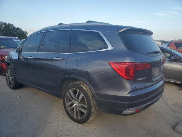 Photo 2 from auction – 2017 HONDA PILOT ELIT with VIN 5FNYF6H04HB012870