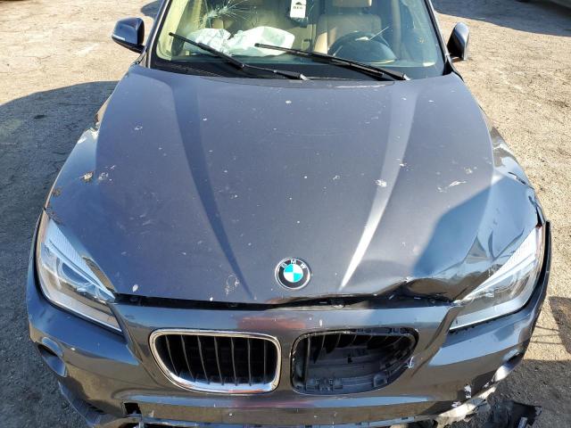 Photo 12 from auction – 2015 BMW X1 SDRIVE2 with VIN WBAVM1C55FV498650