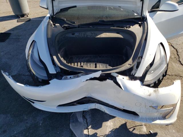 Photo 11 from auction – 2021 TESLA MODEL 3 with VIN 5YJ3E1EA3MF928933