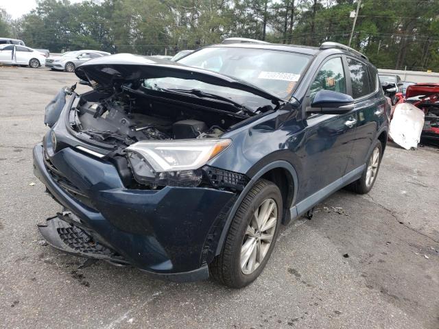 TOYOTA RAV4 LIMIT 2018 with VIN 2T3YFREV1JW461201 - Photo from auction