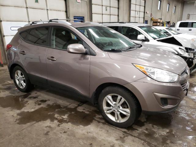 Photo 4 from auction – 2012 HYUNDAI TUCSON GLS with VIN KM8JUCAC8CU397193
