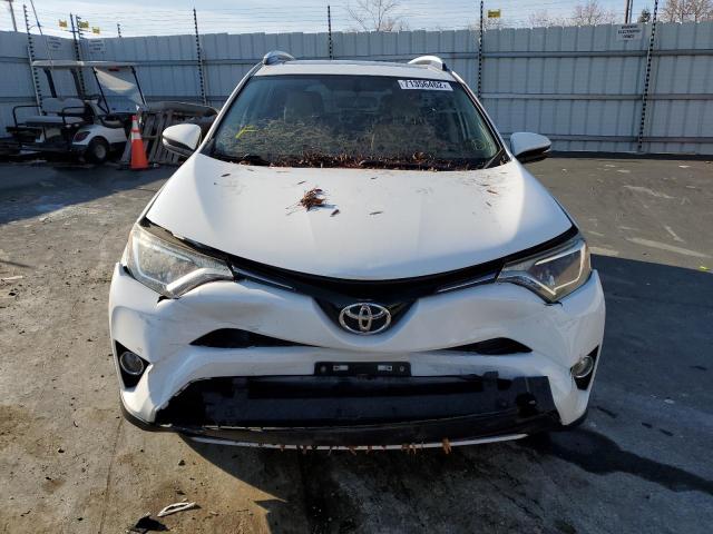 Photo 5 from auction – 2016 TOYOTA RAV4 XLE with VIN JTMRFREV4GD192461