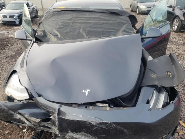 Photo 12 from auction – 2021 TESLA MODEL Y with VIN 5YJYGAEE7MF211566