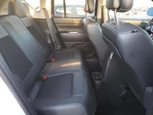 Photo 11 from auction – 2014 JEEP COMPASS LA with VIN 1C4NJDEB9ED644794