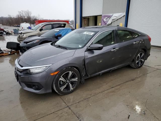 Photo 1 from auction – 2018 HONDA CIVIC TOUR with VIN JHMFC1F98JX040122