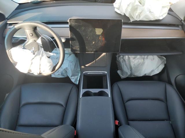 Photo 8 from auction – 2022 TESLA MODEL Y with VIN 7SAYGDEF2NF335825