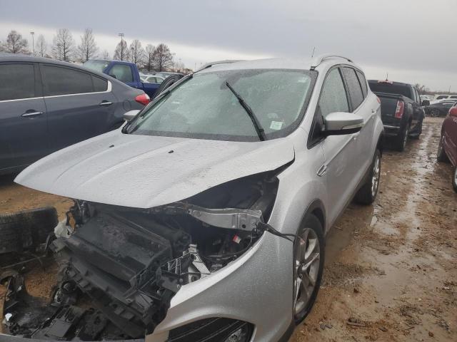 FORD ESCAPE TIT 2014 with VIN 1FMCU0JX4EUB73576 - Photo from auction