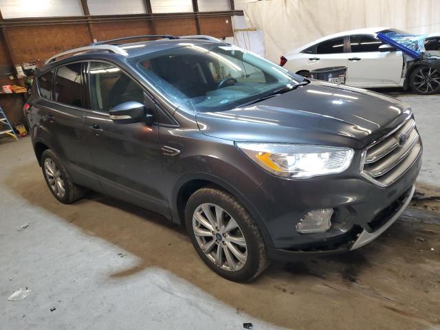 Photo 4 from auction – 2018 FORD ESCAPE TIT with VIN 1FMCU9J95JUB22426