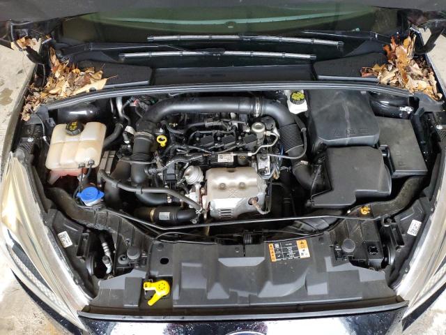 Photo 11 from auction – 2018 FORD FOCUS SE with VIN 1FADP3FE0JL329482