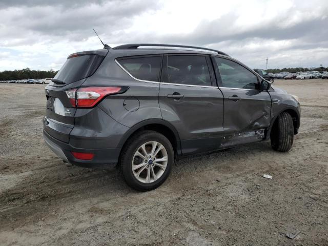 Photo 3 from auction – 2018 FORD ESCAPE SE with VIN 1FMCU0GD0JUB53803