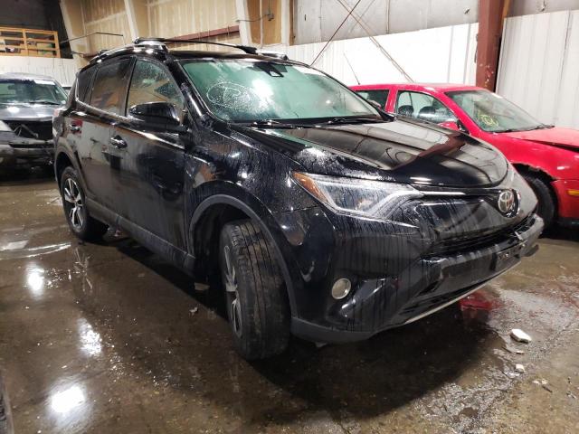 Photo 4 from auction – 2017 TOYOTA RAV4 XLE with VIN 2T3RFREV2HW668663