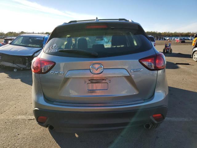 Photo 6 from auction – 2014 MAZDA CX-5 SPORT with VIN JM3KE2BE4E0321732