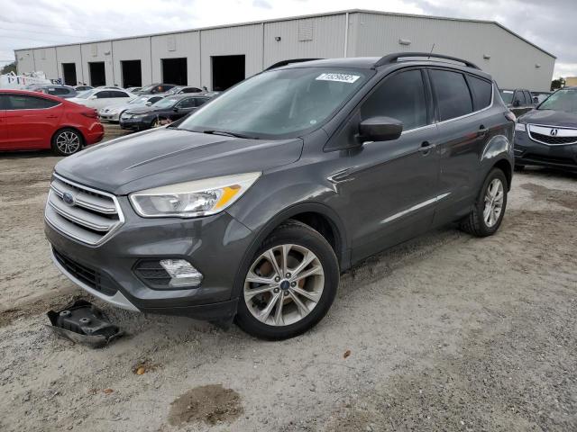 FORD ESCAPE SE 2018 with VIN 1FMCU0GD0JUB53803 - Photo from auction