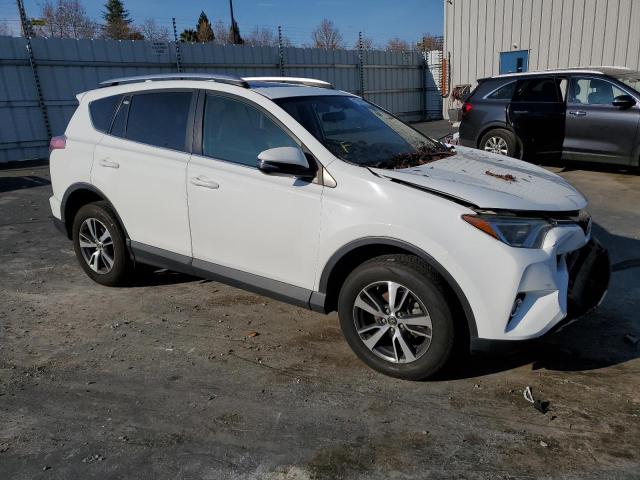 Photo 4 from auction – 2016 TOYOTA RAV4 XLE with VIN JTMRFREV4GD192461