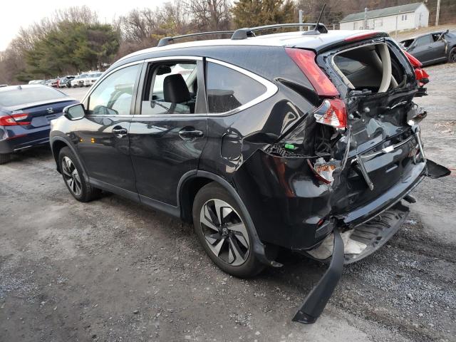 Photo 2 from auction – 2016 HONDA CR-V TOURI with VIN 5J6RM4H95GL091677