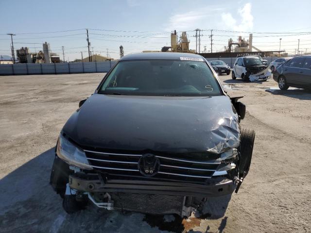 Photo 5 from auction – 2017 VOLKSWAGEN JETTA S with VIN 3VW2B7AJ7HM377854