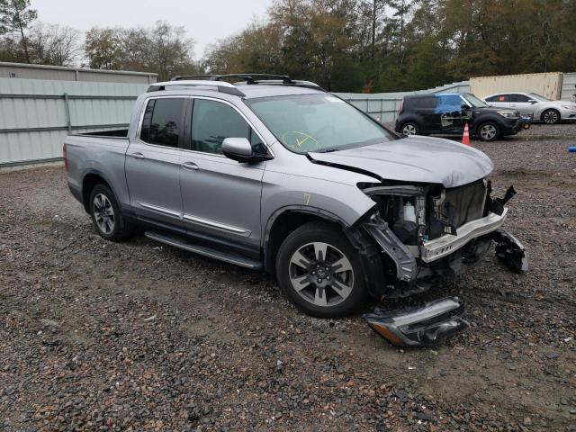 Photo 4 from auction – 2017 HONDA RIDGELINE with VIN 5FPYK2F52HB003336