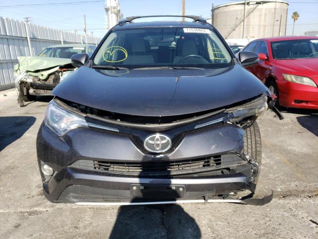 Photo 5 from auction – 2016 TOYOTA RAV4 XLE with VIN JTMWFREV5GJ072396