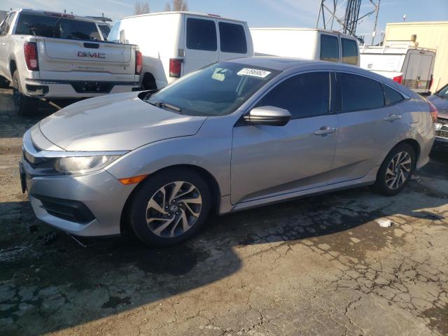 HONDA CIVIC EX 2017 with VIN 19XFC2F7XHE221190 - Photo from auction