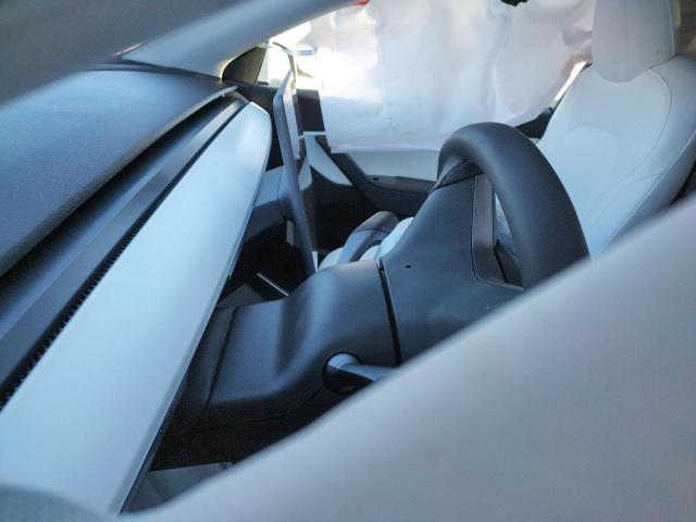 Photo 7 from auction – 2021 TESLA MODEL Y with VIN 5YJYGDEE4MF076127