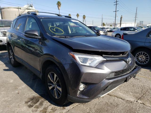 Photo 4 from auction – 2016 TOYOTA RAV4 XLE with VIN JTMWFREV5GJ072396