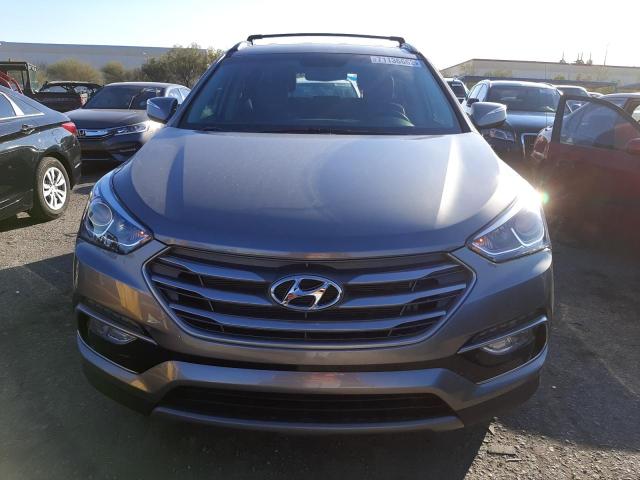 Photo 5 from auction – 2017 HYUNDAI SANTA FE S with VIN 5NMZU3LB5HH022243
