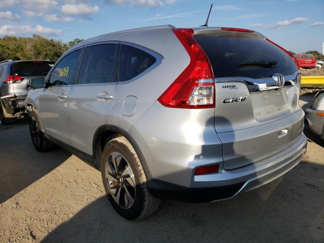 Photo 2 from auction – 2016 HONDA CR-V TOURI with VIN 5J6RM3H98GL005210