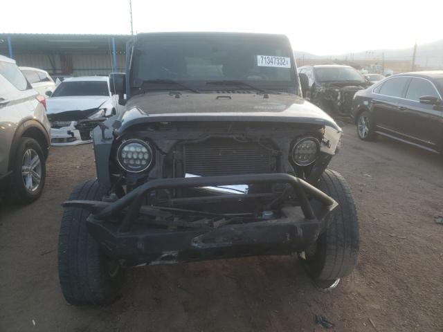 Photo 5 from auction – 2015 JEEP WRANGLER U with VIN 1C4BJWDG1FL626048