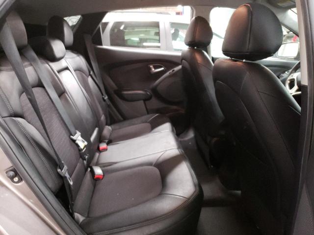 Photo 11 from auction – 2012 HYUNDAI TUCSON GLS with VIN KM8JUCAC8CU397193