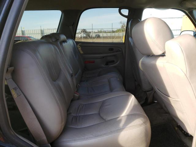 Photo 11 from auction – 2004 GMC YUKON with VIN 1GKEC13TX4J209405