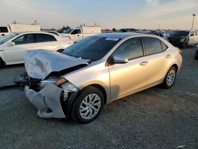 TOYOTA COROLLA L 2019 with VIN 5YFBURHEXKP875127 - Photo from auction