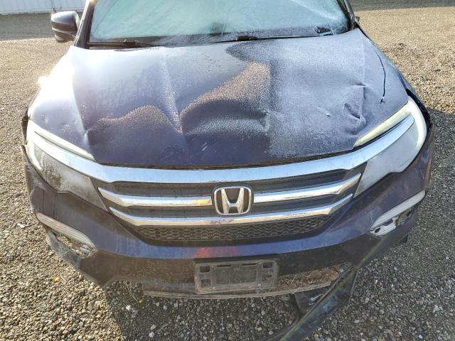 Photo 12 from auction – 2018 HONDA PILOT EXL with VIN 5FNYF6H84JB047999